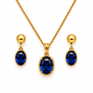 Vergoldetes Silber-Schmuckset mit ovalen blauen Saphiren